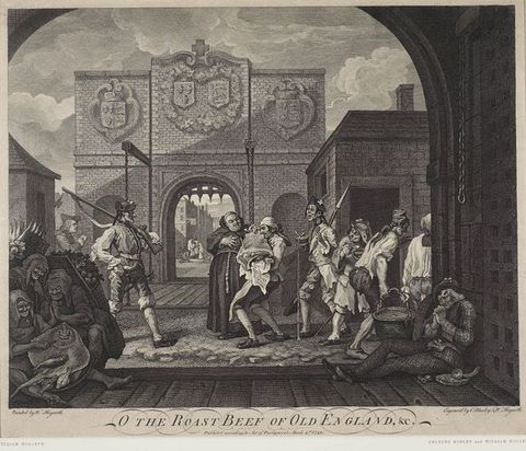 Print. Men and women gather or move through a building-lined town square. At the centre, a bow tying a man’s wig is larger than his head. His long coat is ornamented down the front, and a tire-like fur muff hangs from his wrist. A dog defecates on the pavement just behind his feet.